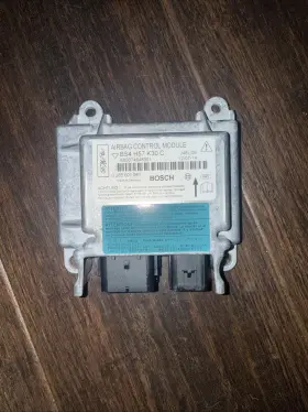 BS4H57K30C MAZDA Bag Control Module